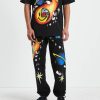 Wholesale MARKET Smiley Conflicted Sweatpants In Black